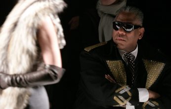 André Leon Talley remembers paging through Vogue for the first time as a child — it was like falling down a "rabbit hole" into "a world of glamour," he says. Talley is the subject of a new documentary called The Gospel According to André. He is shown above at the Carolina Herrera Fall 2007 fashio